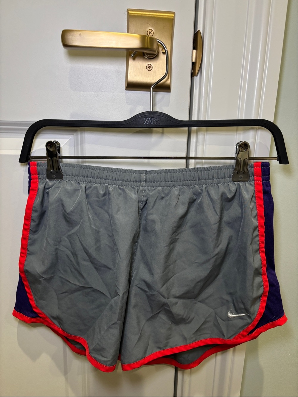 Nike Women’s Gray Athletic Shorts with Red Trim and Purple Panels